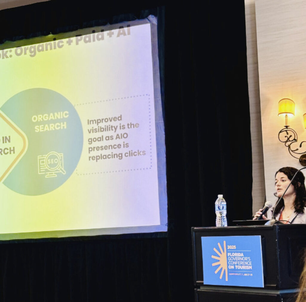 AI SEO presentation slide showing the relationship between paid search, organic search, and AI in search, presented at the VISIT FLORIDA Governor’s Conference